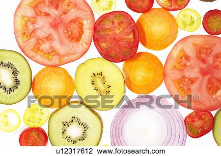 Slices of vegetables and fruits View Large Photo Image Stock Image - Slices of vegetables and fruits. Fotosearch