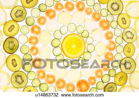 Slices of vegetables and fruits View Large Photo Image Stock Image - Slices of vegetables and fruits. Fotosearch