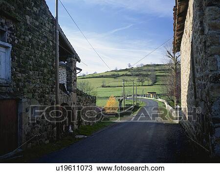 Stock Image - Small village in Auvergne, France. Fotosearch