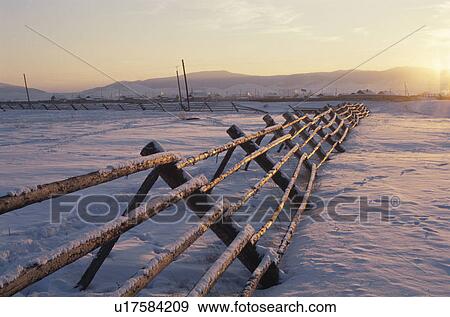 Snow field and fence, Ulan, Russia View Large Photo Image Stock Photo - Snow field and fence, Ulan, Russia. Fotosearch