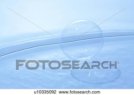 Soap bubble on water surface, blue background View Large Photo Image Stock Image - Soap bubble on water surface, blue background. Fotosearch