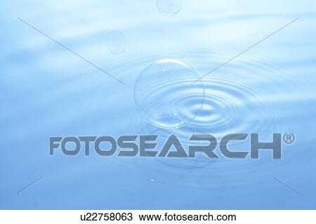 Soap bubble on water surface, blue background View Large Photo Image Stock Image - Soap bubble on water surface, blue background. Fotosearch