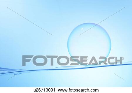Soap bubble on water surface, blue background View Large Photo Image Stock Image - Soap bubble on water surface, blue background. Fotosearch