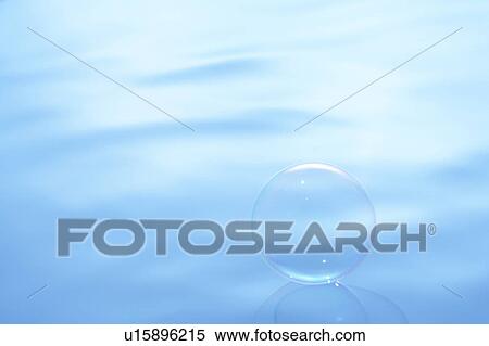 Soap bubble on water surface, blue background, copy space View Large Photo Image Stock Photography - Soap bubble on water surface, blue background, copy space. Fotosearch