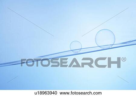 Soap bubbles on water surface, blue background, copy space View Large Photo Image Stock Image - Soap bubbles on water surface, blue background, copy space. Fotosearch
