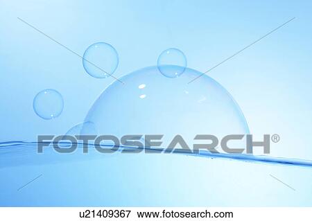 Soap bubbles on water surface, blue background View Large Photo Image Stock Photo - Soap bubbles on water surface, blue background. Fotosearch