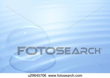 Soap bubbles on water surface, blue background View Large Photo Image Stock Photograph - Soap bubbles on water surface, blue background. Fotosearch