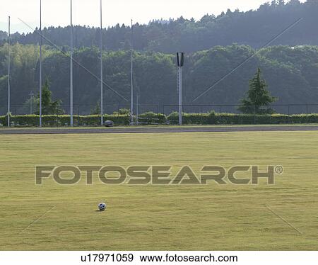 Soccer ball on a field View Large Photo Image Stock Photo - Soccer ball on a field. Fotosearch