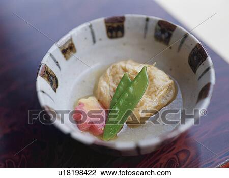 Stock Image - Soy milk skin in bowl. Fotosearch
