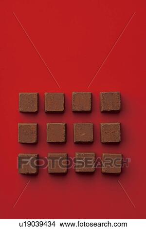 Square chocolate pieces View Large Photo Image Picture - Square chocolate pieces. Fotosearch