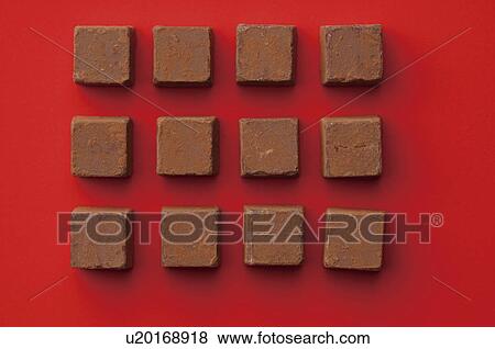 Stock Photo - Square chocolate pieces. Fotosearch