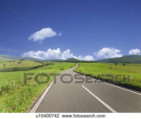 Stock Image - Straight road, Kamishihoro, Hokkaido, Japan. Fotosearch