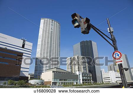 Stock Photo - Street lined with skyscrapers. Nakanoshima, Nishi-ku, Osaka, Japan. Fotosearch