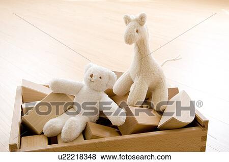 Stuffed animals and building blocks in a box View Large Photo Image Stock Photo - Stuffed animals and building blocks in a box. Fotosearch