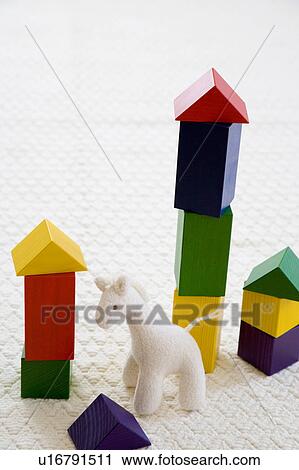 Stock Image - Stuffed giraffe and building blocks. Fotosearch