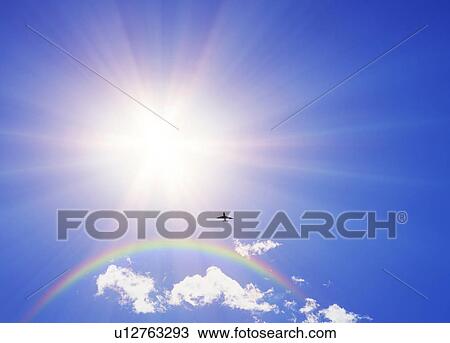 Sun shining in a blue sky with a plane and a rainbow, Odaiba, Minato-ku, Tokyo, Japan View Large Photo Image Stock Image - Sun shining in a blue sky with a plane and a rainbow, Odaiba, Minato-ku, Tokyo, Japan. Fotosearch