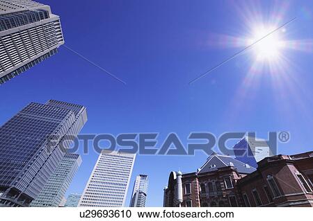 Sun shining on Marunouchi building group, Marunouchi, Chiyoda-ku, Tokyo, Japan View Large Photo Image Stock Image - Sun shining on Marunouchi building group, Marunouchi, Chiyoda-ku, Tokyo, Japan. Fotosearch