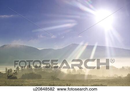 Sun shining on mountains and grasslands, Aomori Prefecture, Japan View Large Photo Image Stock Image - Sun shining on mountains and grasslands, Aomori Prefecture, Japan. Fotosearch