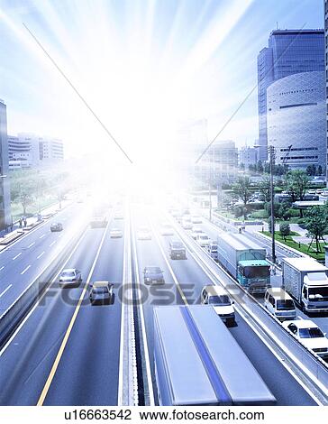 Sun shining over a city expressway View Large Photo Image Stock Image - Sun shining over a city expressway. Fotosearch