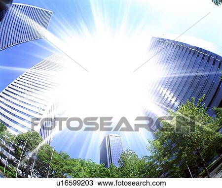 Sun shining over skyscrapers View Large Photo Image Stock Image - Sun shining over skyscrapers. Fotosearch