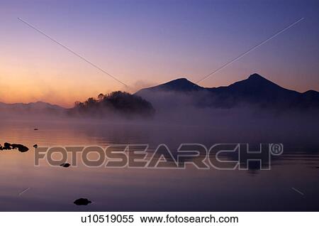 Stock Photography - Sunrise over Hinohara lake, Kitashiobara-son, Fukushima Prefecture, Japan. Fotosearch