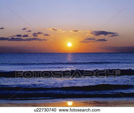 Stock Image - Sunrise over sea, Shimoda, Shizuoka Prefecture, Japan. Fotosearch