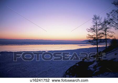 Stock Image - Sunset over Lake Baikal, Russia. Fotosearch