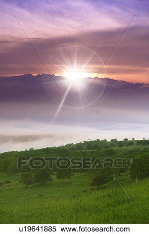 Stock Photography - Sunset over mountains and Sugadaira plateau, Nagano Prefecture, Japan. Fotosearch