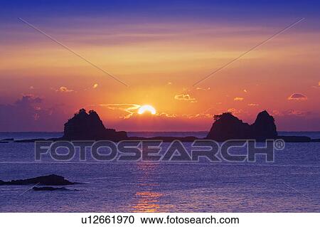 Stock Image - Sunset over sea, Kushimoto-machi, Wakayama Prefecture, Japan. Fotosearch
