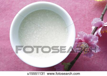 Stock Image - Sweet drink made from fermented rice. Fotosearch