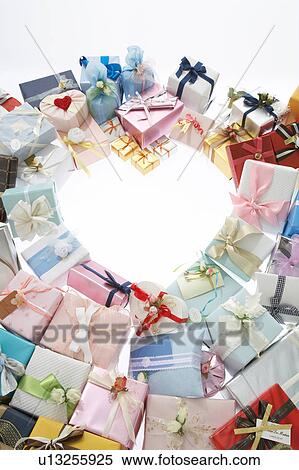 Stock Photography - The present located in a line with the heart shape. Fotosearch