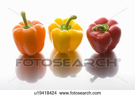 Picture - Three bell peppers. Fotosearch