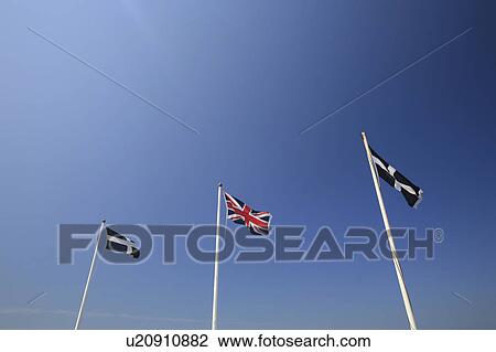 Three flags fluttering in the breeze View Large Photo Image Stock Image - Three flags fluttering in the breeze. Fotosearch