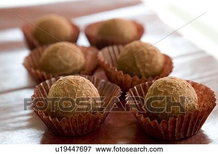 Stock Photo - Truffles in cupcake wrappers. Fotosearch