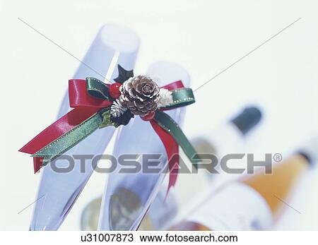 Two champagne glasses tied with ribbon View Large Photo Image Stock Image - Two champagne glasses tied with ribbon. Fotosearch