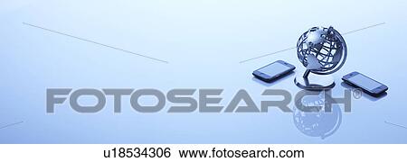 Two mobile phones and a globe View Large Photo Image Stock Photograph - Two mobile phones and a globe. Fotosearch