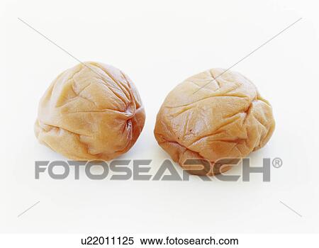 Stock Photography - Two pickled plums, Wakayama Prefecture, Japan. Fotosearch