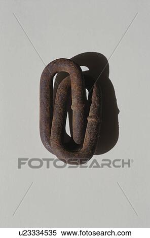 Stock Photography - Two rusty chain links on white background. Fotosearch