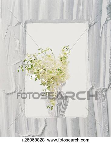 Stock Photo - Vase of flowers in a textured white frame. Fotosearch