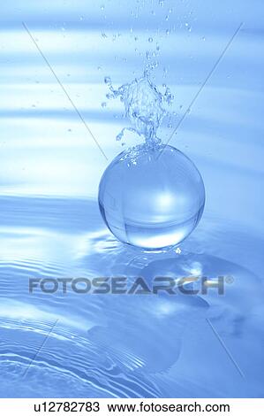 Stock Image - Water and a sphere. Fotosearch