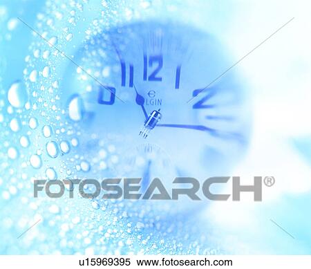 Stock Photography - Water droplets over a clock. Fotosearch