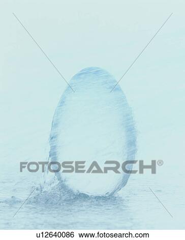 Water hitting ellipse shaped glass View Large Photo Image Stock Photograph - Water hitting ellipse shaped glass. Fotosearch