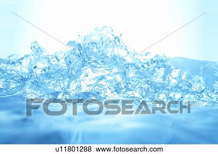 Stock Photo - Water splashing, close up, blue background. Fotosearch
