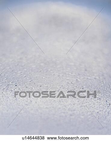 Stock Photo - Waterdrops on a grey surface. Fotosearch