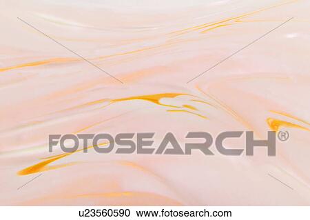 Stock Image - Whipped cream with color. Fotosearch