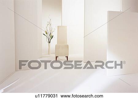 White chair and vase of flowers View Large Photo Image Stock Image - White chair and vase of flowers. Fotosearch