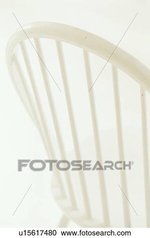 White wooden chair against white wall View Large Photo Image Stock Image - White wooden chair against white wall. Fotosearch
