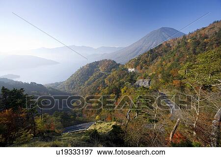 Stock Photo - Winding road through mountain range. Tochigi Prefecture, Japan. Fotosearch