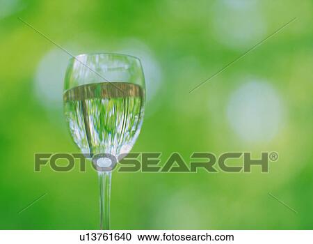 Stock Image - Wineglass full of water. Fotosearch