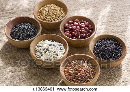 Wooden bowls of different grains and beans View Large Photo Image Stock Image - Wooden bowls of different grains and beans. Fotosearch